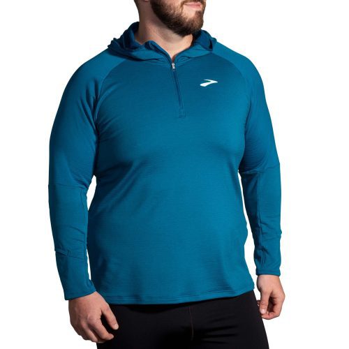 Front view of a model wearing a Brooks Men's Notch Thermal Hoodie 2.0 in the Heather Dark Ocean/Dark Ocean colourway.  (8007425589410)