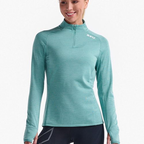 Front view of a model wearing a 2XU Women's Ignition 1/4 Zip in the Raft/White Reflective colourway. Model is also wearing 2XU leggings. (8250149404834)