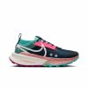 Lateral side of the right shoe from a pair of Nike Women's Zegama 2 Trail Running Shoes in the Armory Navy/Sail-Green Frost-Vivid Grape colourway  (8399042150562)