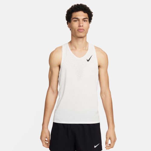 Front view of a model wearing a Nike Men's AeroSwift Dri-FIT ADV Running Singlet in the Summit White/Black colourway. Model is also wearing Nike shorts.  (8186007322786)