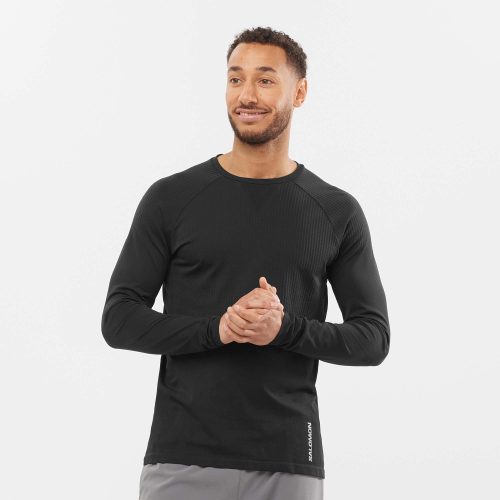 Front view of a model wearing a men's Salomon Sense Aero Long Sleeve T-Shirt (7766862168226)