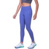 Front view of a model wearing the Ronhill Women's Tech Tight in the Dark Periwinkle/Aquamint colourway. Model us also wearing a Ronhill top and Altra running shoes. (8158835572898)